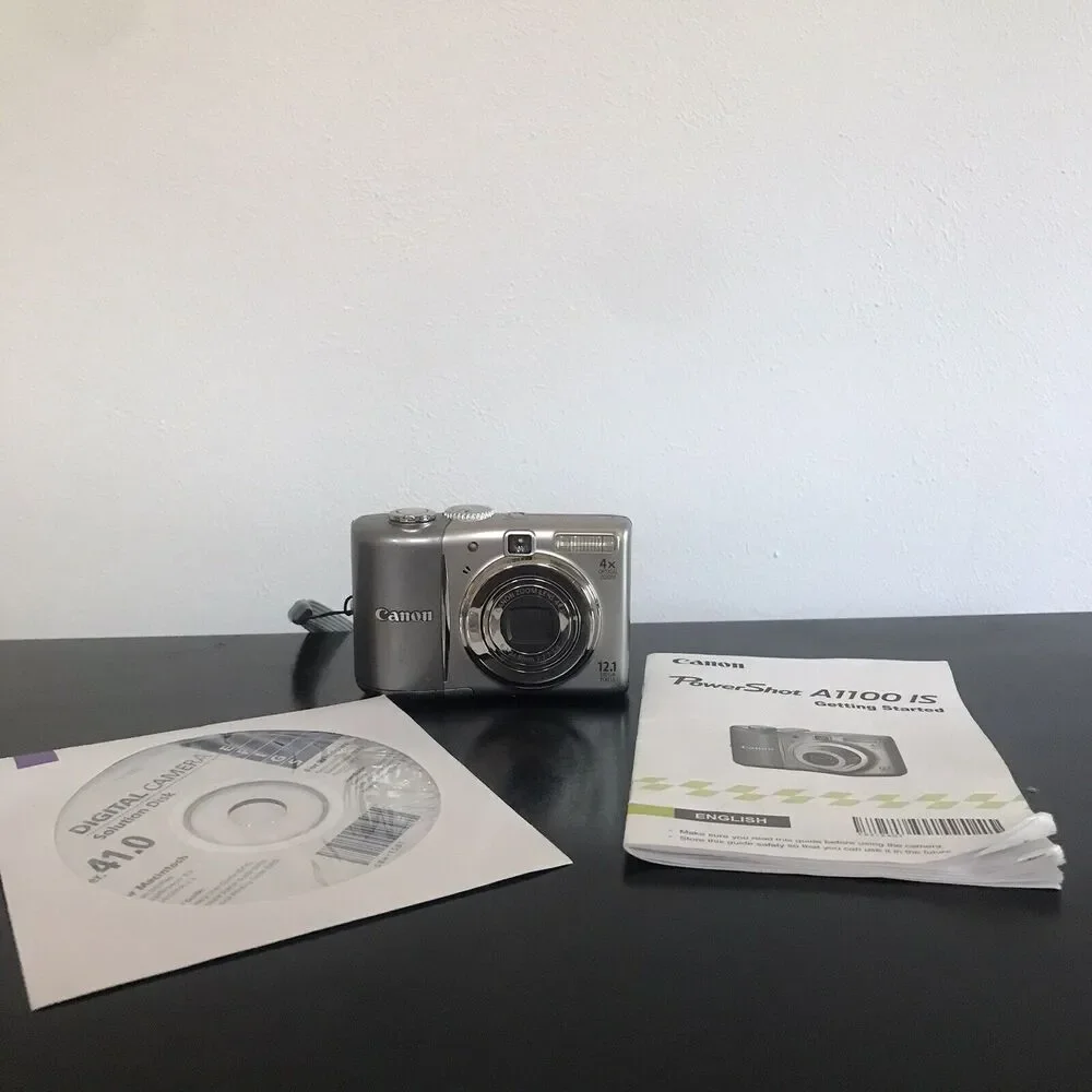 Canon PowerShot A1100IS 12.1 MP Digital Camera 4x Optical Image Stabilized WORKS